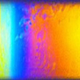 Illustration for article titled Watch an iridescent "kiss" between magnetized soap bubbles